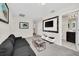 Comfortable common area with a sofa and TV at 1616 Carey Palm Cir, Kissimmee, FL 34747