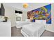 Fun ' bedroom with twin beds and Toy Story mural at 1616 Carey Palm Cir, Kissimmee, FL 34747