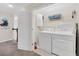 Convenient laundry room with washer and dryer at 1616 Carey Palm Cir, Kissimmee, FL 34747
