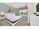 Spacious bedroom with a comfortable bed and large window at 1616 Carey Palm Cir, Kissimmee, FL 34747
