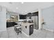 Modern kitchen with island and stainless steel appliances at 1616 Carey Palm Cir, Kissimmee, FL 34747
