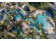 Resort-style pool with water features and lounge areas at 7487 Gathering Dr, Reunion, FL 34747