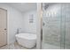 Elegant bathroom featuring a freestanding tub and shower at 7487 Gathering Dr, Reunion, FL 34747