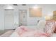 Bright bedroom with a cozy bed and en-suite bathroom at 7487 Gathering Dr, Reunion, FL 34747