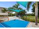 Outdoor entertainment area with ping pong and connect four at 7487 Gathering Dr, Reunion, FL 34747