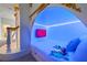 Princess-themed bedroom alcove with TV and LED lighting at 7487 Gathering Dr, Reunion, FL 34747