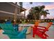 Relaxing fire pit area next to the pool at 7487 Gathering Dr, Reunion, FL 34747