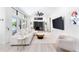 Spacious living area with large TV, comfortable seating and access to pool at 7487 Gathering Dr, Reunion, FL 34747