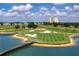 Aerial view of golf course and clubhouse at 7487 Gathering Dr, Reunion, FL 34747
