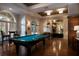 Game room with pool table, comfortable seating at 501 Mirasol Cir # 505, Celebration, FL 34747