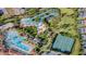 Resort-style community pool with lazy river, water features, and tennis courts at 6078 Broad Oak Dr, Davenport, FL 33837