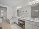 Elegant bathroom with double sinks, soaking tub and separate shower at 8405 Riverdale Ln, Davenport, FL 33896