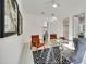 Spacious home office with glass desk and comfortable seating at 9217 Hidden Bay Ln, Orlando, FL 32819