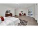 Main bedroom with king bed and access to the pool area at 9217 Hidden Bay Ln, Orlando, FL 32819