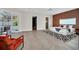 Spacious main bedroom with herringbone floors and pool access at 9217 Hidden Bay Ln, Orlando, FL 32819
