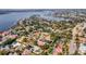 Aerial view highlighting a home's desirable location in a lakefront community at 9217 Hidden Bay Ln, Orlando, FL 32819