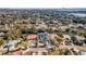 Aerial view of a luxury home with a large backyard and swimming pool at 9217 Hidden Bay Ln, Orlando, FL 32819