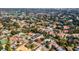 Aerial view showing a home's prime location in a peaceful, tree-lined neighborhood at 9217 Hidden Bay Ln, Orlando, FL 32819