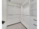 Large closet with hanging rods and shelves at 9217 Hidden Bay Ln, Orlando, FL 32819