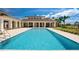Inviting pool area with a spacious deck and stunning views at 4024 Grande Brick Loop # 9, Orlando, FL 32837