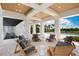 Relaxing pool area with lounge chairs and modern seating at 4024 Grande Brick Loop # 9, Orlando, FL 32837