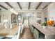 Modern kitchen features a large island, hardwood floors, and a dining area at 4018 Grande Brick Loop # 10, Orlando, FL 32837