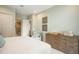 Bedroom with a large dresser and an ensuite bathroom at 4018 Grande Brick Loop # 10, Orlando, FL 32837