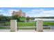 Scenic balcony view of a golf course and resort at 4018 Grande Brick Loop # 10, Orlando, FL 32837