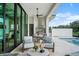 Relaxing patio with outdoor kitchen and pool access at 4018 Grande Brick Loop # 10, Orlando, FL 32837