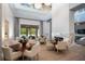 Elegant living area with seating and a marble fireplace at 4018 Grande Brick Loop # 10, Orlando, FL 32837