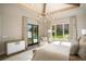 Bright bedroom with pool access and luxurious sitting area at 4018 Grande Brick Loop # 10, Orlando, FL 32837