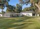Charming single story home with detached workshop at 5715 Se 109Th St, Belleview, FL 34420
