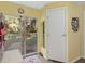 Bright entryway with access to backyard and storage at 5715 Se 109Th St, Belleview, FL 34420