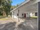 Spacious carport provides covered parking with access to home at 5715 Se 109Th St, Belleview, FL 34420