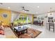 Spacious living room with backyard view and comfortable seating at 6030 Arbor Watch Loop, Orlando, FL 32829