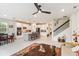 Open concept kitchen and living room with island and modern appliances at 6030 Arbor Watch Loop, Orlando, FL 32829