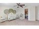 Bedroom with crib, dresser, and a closet at 9149 Outlook Rock Trl, Windermere, FL 34786