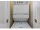 Stackable washer and dryer in a closet at 2433 Caravelle Cir, Kissimmee, FL 34746