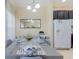 Dining area with table, chairs, and view of kitchen at 2433 Caravelle Cir, Kissimmee, FL 34746