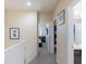 Upstairs hallway with access to bedrooms and bathroom at 2433 Caravelle Cir, Kissimmee, FL 34746