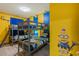 Fun Minion-themed bedroom with bunk beds, perfect for ! at 2433 Caravelle Cir, Kissimmee, FL 34746