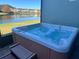 Relax in this hot tub with lake views at 2433 Caravelle Cir, Kissimmee, FL 34746
