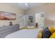 Main bedroom with large TV and ensuite bathroom at 2433 Caravelle Cir, Kissimmee, FL 34746