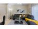 Living room with sectional sofa and coffee table at 2433 Caravelle Cir, Kissimmee, FL 34746