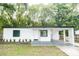 Newly renovated white house with carport at 635 Maitland Ave, Altamonte Springs, FL 32701