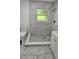 Clean bathroom with marble shower and white vanity at 635 Maitland Ave, Altamonte Springs, FL 32701