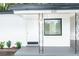 White house with black trim and small porch at 635 Maitland Ave, Altamonte Springs, FL 32701