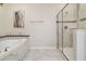 Relaxing bathroom with soaking tub and walk-in shower at 8911 Stinger Dr, Champions Gate, FL 33896