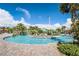 Relaxing lazy river winding through a tropical landscape at 8911 Stinger Dr, Champions Gate, FL 33896