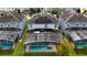 Aerial view showcasing home with solar panels and pool at 8911 Stinger Dr, Champions Gate, FL 33896